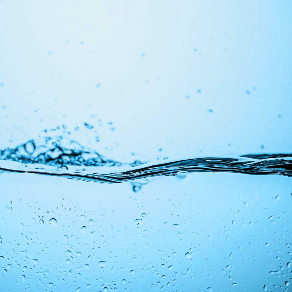 Splashing blue water surface